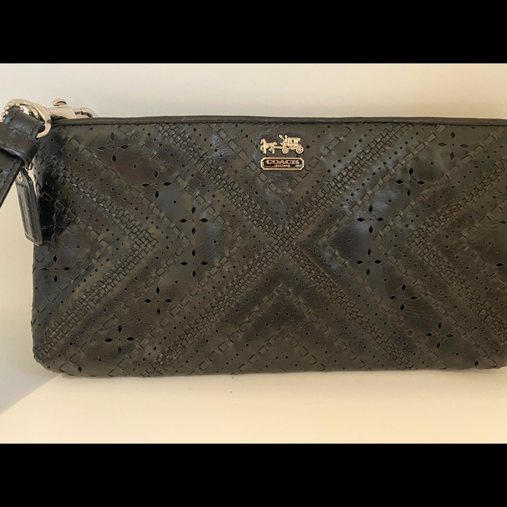 Coach Black Leather Clutch with Laser Cuts.